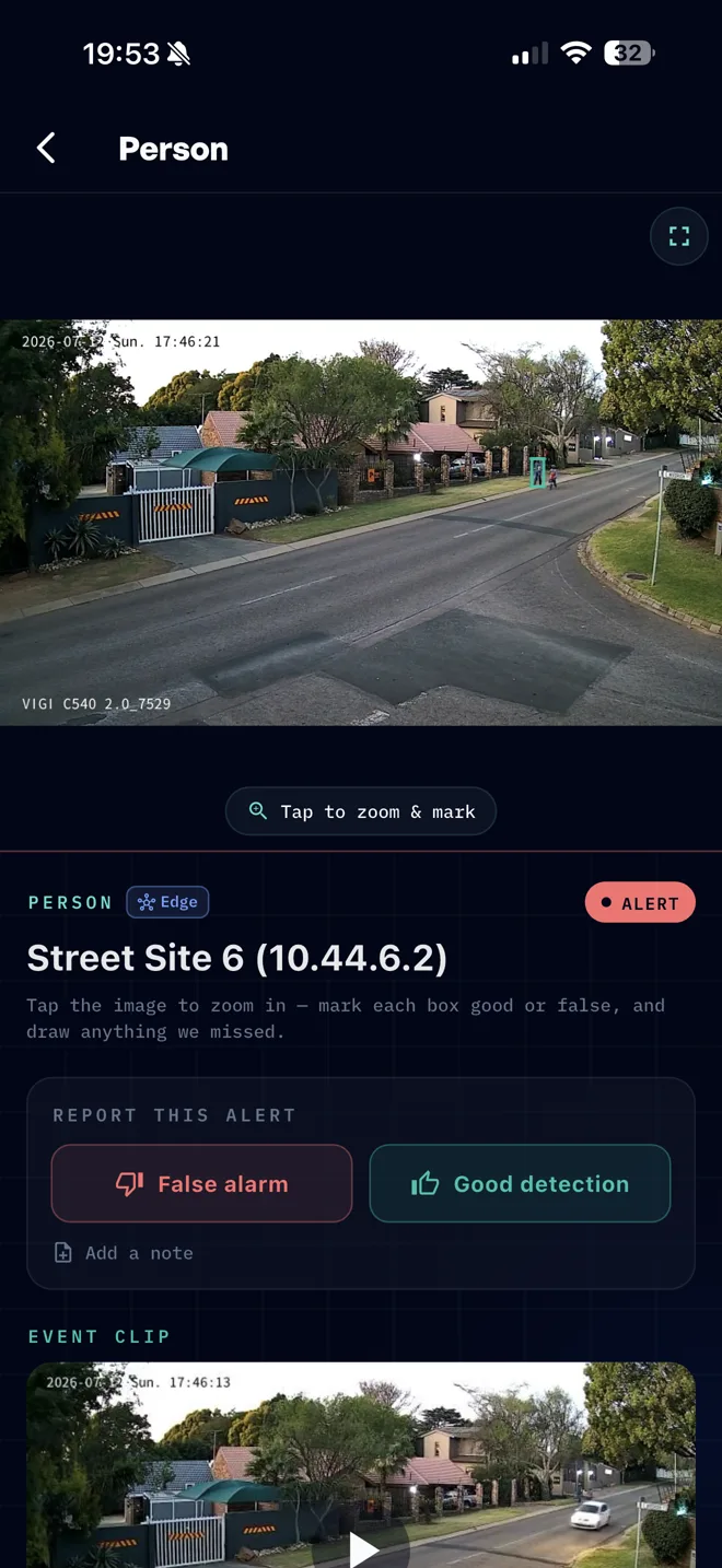 Guard app street-camera alert with False alarm and Good detection buttons